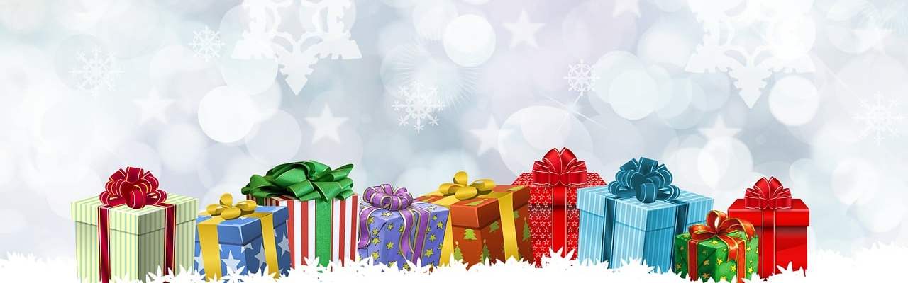 A graphic of boxed Christmas gifts in a row against a snowy backdrop.