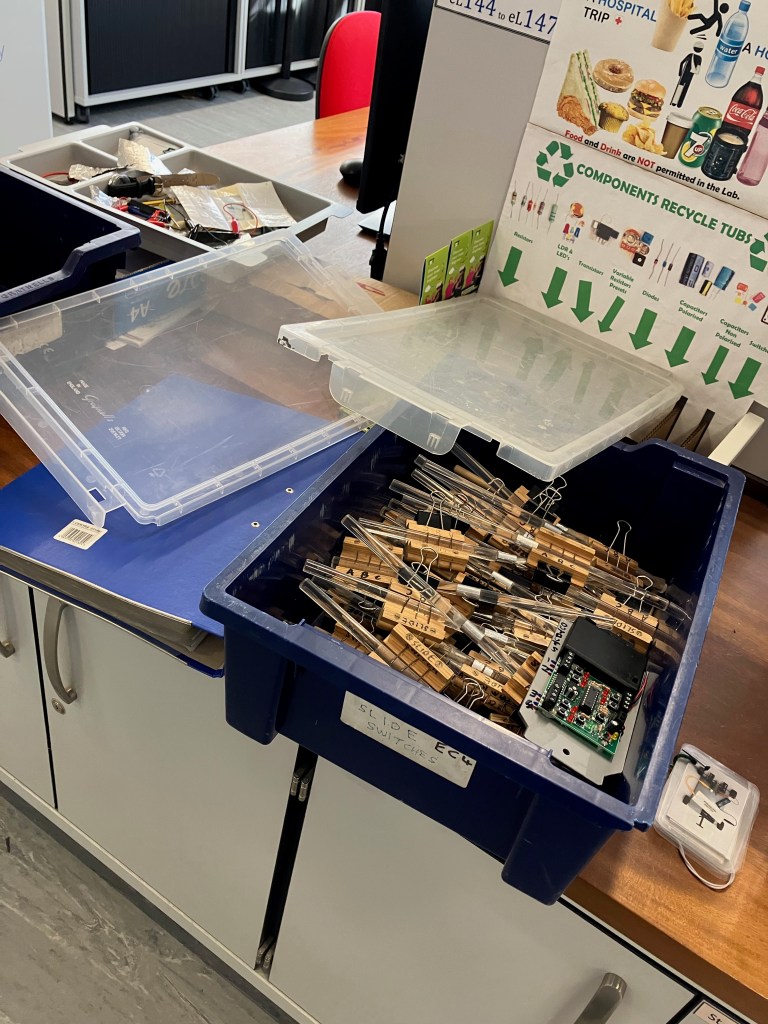 A large blue plastic box (quite solid) which contains all manner of bits of kit that will be used to make the buggies move.
